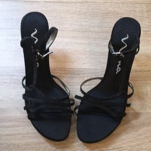 Open toe sling back heels. Size 8M.